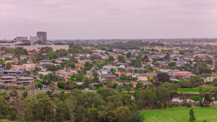 Obraz premium Panoramic Aerial Drone view of Inner Suburbs of Melbourne housing, roof tops, the streets and the parks, the roads and trees of Ascot Vale Moonee Ponds Brunswick Essendon and Maribyrnong in VIC Victor