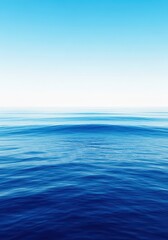 Obraz premium Vast blue ocean scene meeting the sky at the distant horizon, showcasing beautiful clear water and waves rolling toward the shore line, sea, environment, ripple