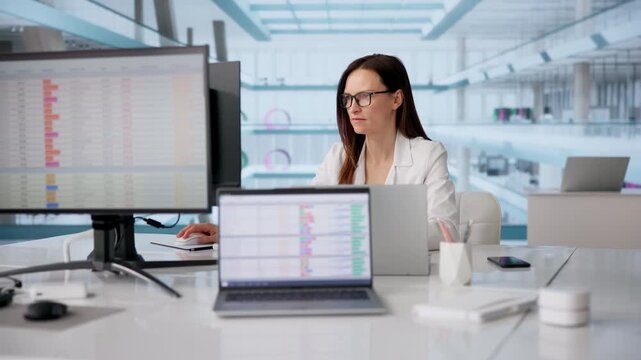 Female Doctor Reviewing Medical Billing Codes