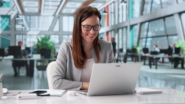 Businesswoman Leading A Webinar Interview, Speaking Confidently