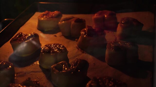 Baking banan caramel puff pastries in the oven, close-up timelapse