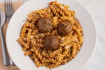 rotoni   top with meat balls and hrbs
