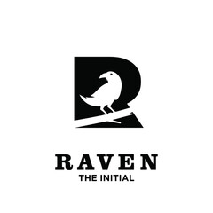 Fototapeta premium Raven Bird Perched on Branch Integrated into Letter R Initial Logo Design Black and White