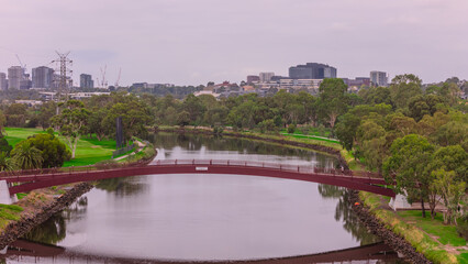 Fototapeta premium Panoramic Aerial Drone view of Inner Suburbs of Melbourne housing, roof tops, the streets and the parks, the roads and trees of Ascot Vale Moonee Ponds Brunswick Essendon and Maribyrnong in VIC Victor