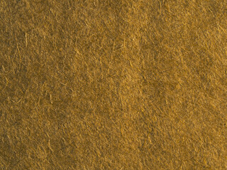 Golden Brown Paper Texture Closeup With Natural Fibers Warm Handmade Background Surface