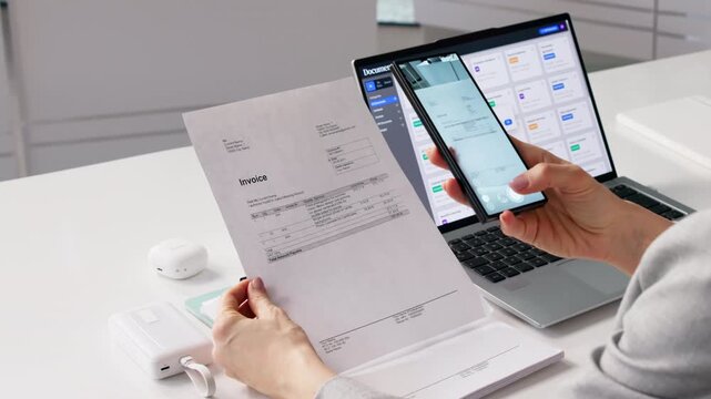Data Analyst Takes Phone Photo Of Document