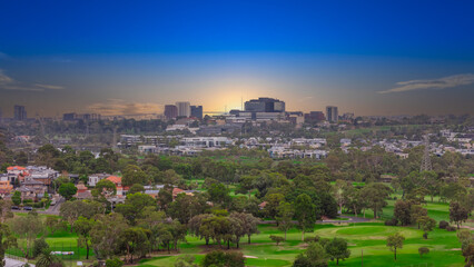 Obraz premium Panoramic Aerial Drone view of Inner Suburbs of Melbourne housing, roof tops, the streets and the parks, the roads and trees of Ascot Vale Moonee Ponds Brunswick Essendon and Maribyrnong in VIC Victor