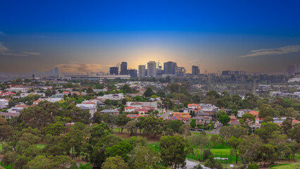 Obraz premium Panoramic Aerial Drone view of Inner Suburbs of Melbourne housing, roof tops, the streets and the parks, the roads and trees of Ascot Vale Moonee Ponds Brunswick Essendon and Maribyrnong in VIC Victor