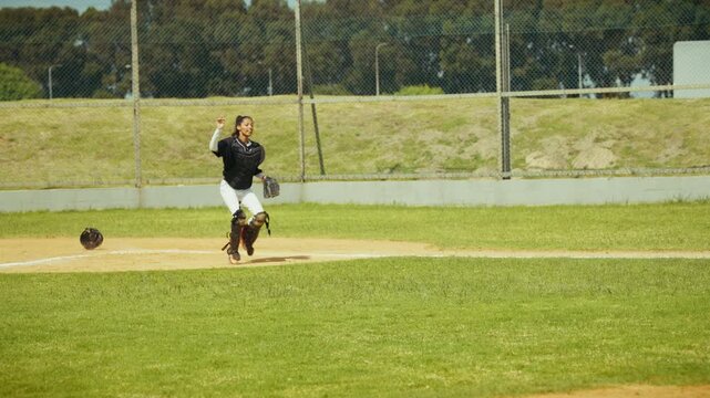Baseball players execute a hit and run play