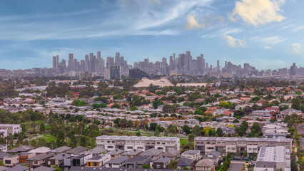 Fototapeta premium Panoramic Aerial Drone view of Inner Suburbs of Melbourne housing, roof tops, the streets and the parks, the roads and trees of Ascot Vale Moonee Ponds Brunswick Essendon and Maribyrnong in VIC Victor