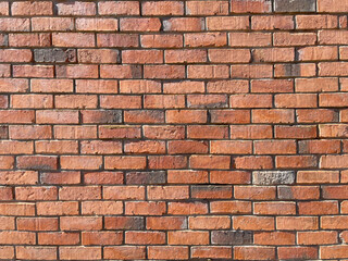 Fototapeta premium Red brick wall texture background with traditional masonry pattern.