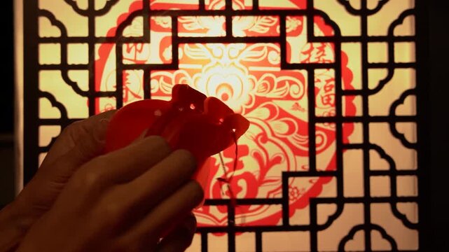 Chinese Red Lantern Through Traditional Window Frame