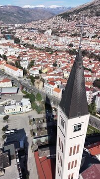Aerial view of the Peace Bell Tower and Franciscan Church in Mostar, Bosnia and Herzegovina