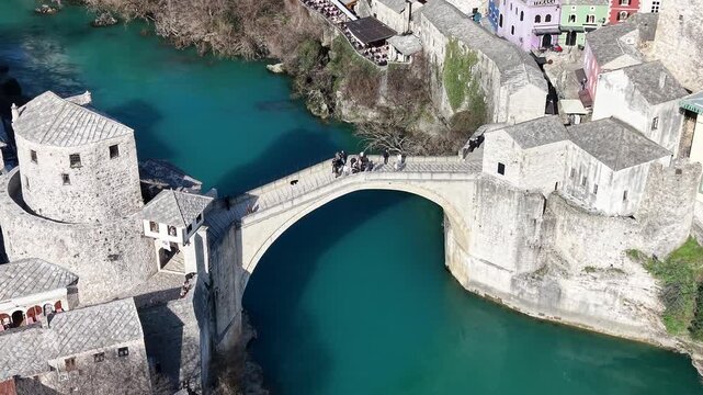 Drone aerial view of Stari Most (Old Bridge) and Koski Mehmed Pasha Mosque in Mostar, Bosnia and Herzegovina
