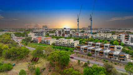 Panoramic Aerial Drone view of Inner Suburbs of Melbourne housing, roof tops, the streets and the parks, the roads and trees of Ascot Vale Moonee Ponds Brunswick Essendon and Maribyrnong in VIC Victor © Elias Bitar