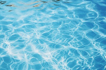 Obraz premium Blue pool water creating abstract wavy patterns and shiny reflections