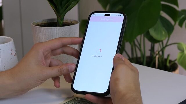 Close-up of a person using a food delivery app on a smartphone at home. Scrolling through diverse restaurant options like pizza, burgers, and sushi. High-quality UI for food service, e-commerce, and
