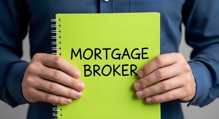 Mortgage Broker Services: Person holding lime green notebook with mortgage broker text, real estate financing, home loan and property investment concept