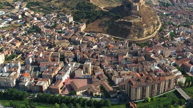 An Aerial panoramic view of the old town of the city  Monzon on a sunny summer noon in Spain.