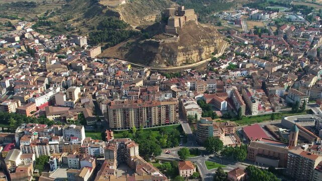 An Aerial panoramic view of the old town of the city  Monzon on a sunny summer noon in Spain.