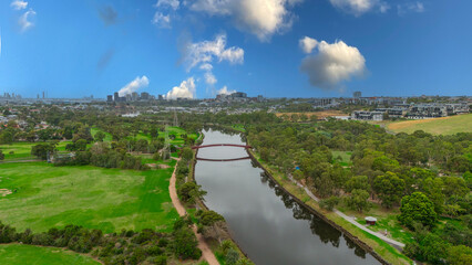 Panoramic Aerial Drone view of Inner Suburbs of Melbourne housing, roof tops, the streets and the parks, the roads and trees of Ascot Vale Moonee Ponds Brunswick Essendon and Maribyrnong in VIC Victor