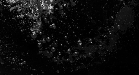 Obraz premium Abstract black water surface texture with cosmetic moisturizer bubbles