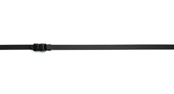 Black flexible cable tie laid on a clear white background showcasing its effectiveness in cable organization