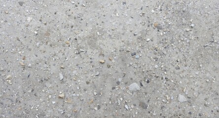 detailed concrete texture with varied stone aggregates and balanced gray finish