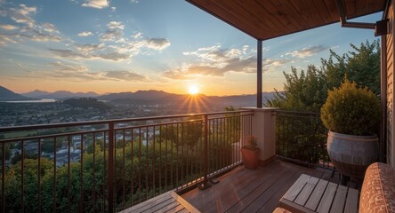 Fototapeta premium Charming balcony sunset with warm wooden table and panoramic landscape ideal for marketing