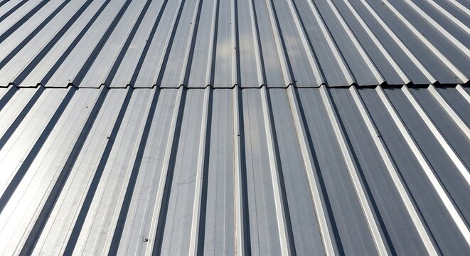 Industrial metal cladding with rhythmic patterns and subtle highlights