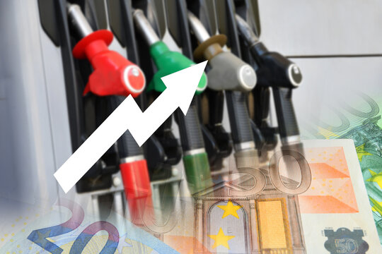 Gas pumps at a gas station with euro banknotes. Rising prices. Concept of rising gasoline and diesel prices due to the war in the Middle East.