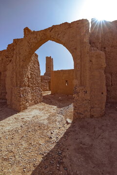 Sunstar cast over the adobe brick remains, plastered with rammed earth (pis&eacute;) and mud, of a former French Foreign Legion fort. Ksar Guedim-Morocco-171