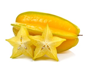 Fototapeta premium Ripe yellow star fruit, one whole and two cross-sections, isolated on white