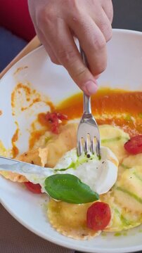 Ravioli tomato sauce main course tasty snack fresh delicious gourmet food on the table rustic food top view copy space. High quality FullHD footage