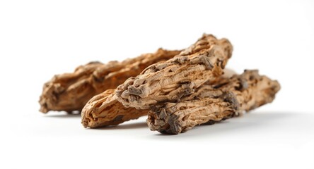 Obraz premium White backdrop highlighting rough textured dried liquorice roots