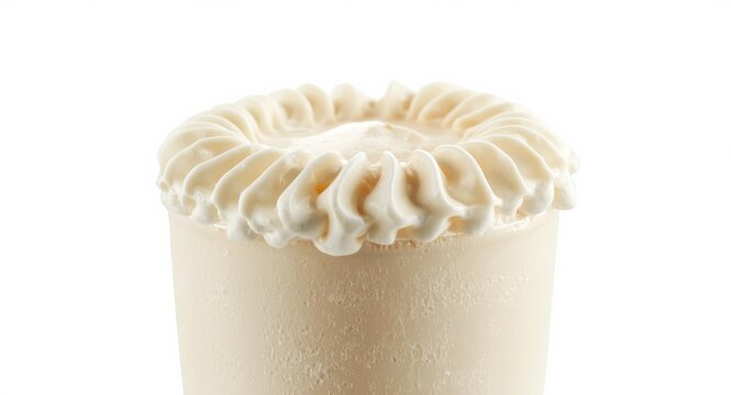 Close perspective of a milkshake with thick textured cream ends isolated on a white backdrop