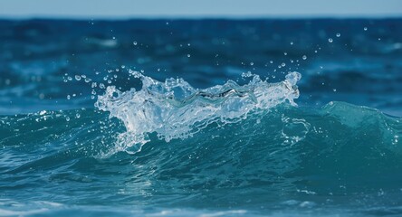 Fototapeta premium Crown splash formed from dropping blue water on dynamic sea waves