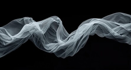 Fototapeta premium Airborne textile lace in white swirling against a black moody backdrop