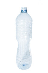 Plastic bottle. Close up of used pet containers on white canvas