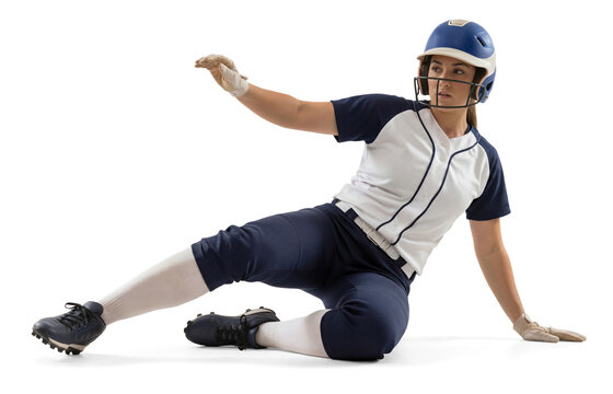 Full body view of a female athlete sliding on the ground on isolated background