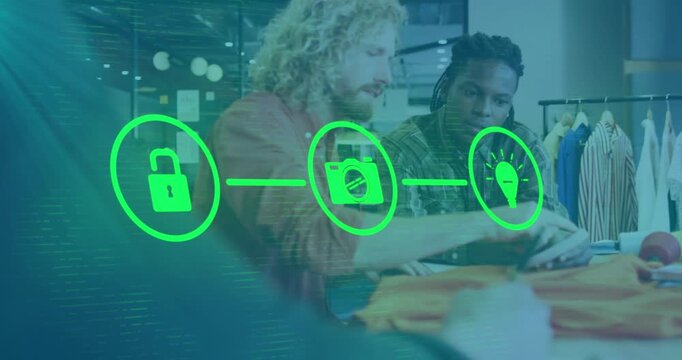 Animation of flowchart of icons over diverse designers discussing about clothes design in office