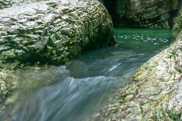 mountain river in the canyon, blurred in motion