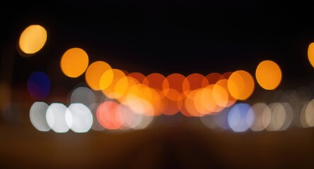 colorful illuminated bokeh surrounding blurred glass at night