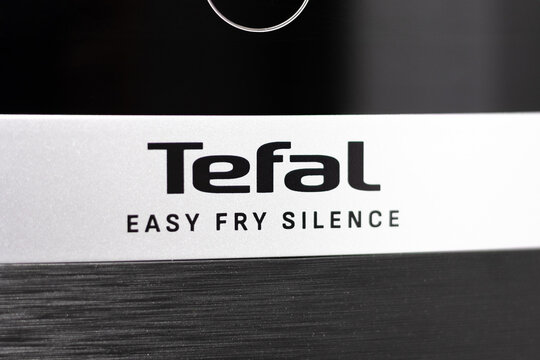 KYIV, UKRAINE - March 05, 2026 :  Close-up of Tefal Easy Fry Silence logo on metallic surface.