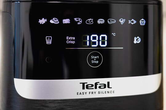 KYIV, UKRAINE - March 05, 2026 : Digital display of Tefal air fryer showing 190 degrees. Close up menu display of settings.