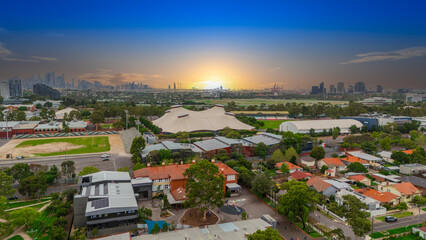 Obraz premium Panoramic Aerial Drone view of Inner Suburbs of Melbourne housing, roof tops, the streets and the parks, the roads and trees of Ascot Vale Moonee Ponds Brunswick Essendon and Maribyrnong in VIC Victor