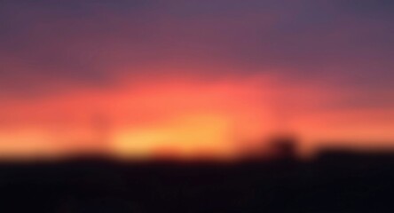 Obraz premium abstract blurred dawn sky wallpaper with warm glowing tones