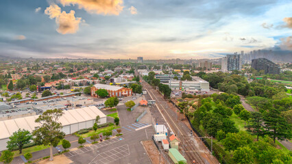 Obraz premium Panoramic Aerial Drone view of Inner Suburbs of Melbourne housing, roof tops, the streets and the parks, the roads and trees of Ascot Vale Moonee Ponds Brunswick Essendon and Maribyrnong in VIC Victor
