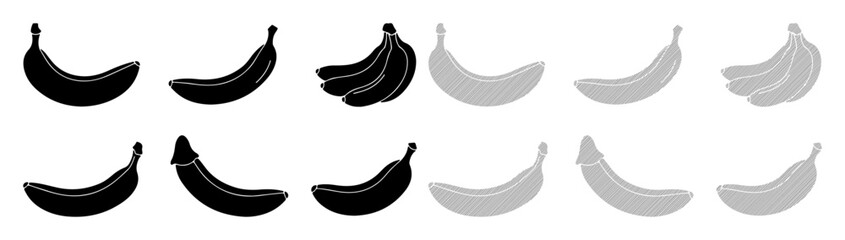 Juxtaposition of black and grey bananas against a white background, showcasing contrast and variety. © MDTUHIN