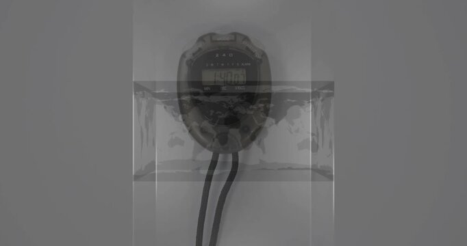 Animation of world map in a cube spinning against close up of a stopwatch on grey background